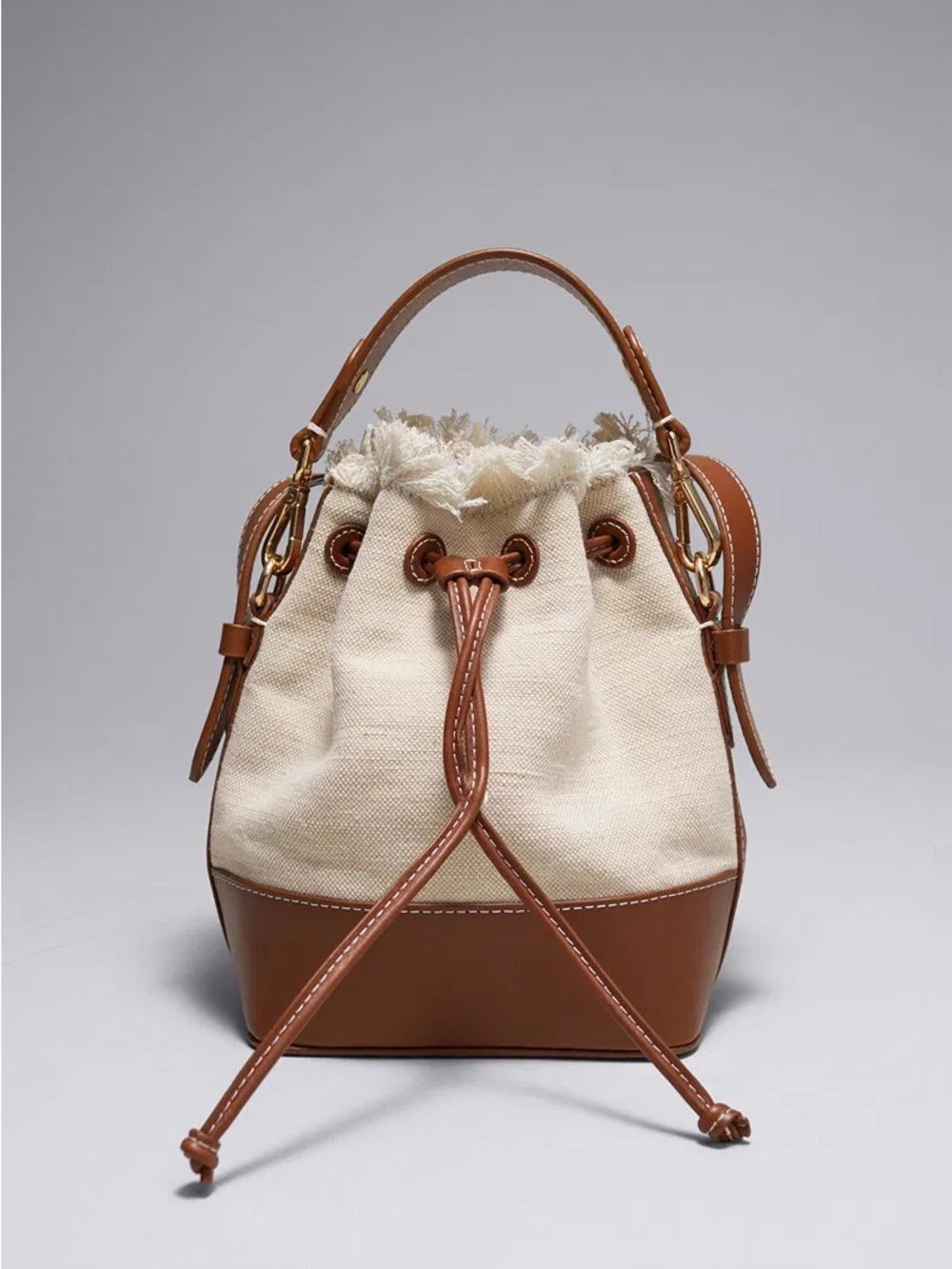 & other stories Canvas and Leather Drawstring Bucket Bag in Cream and Tan